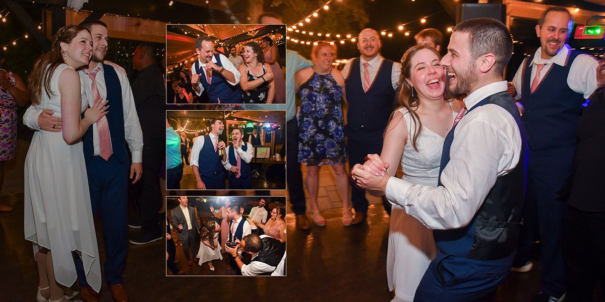 Wedding couple dancing with guests watching and smiling at a warmly lit reception