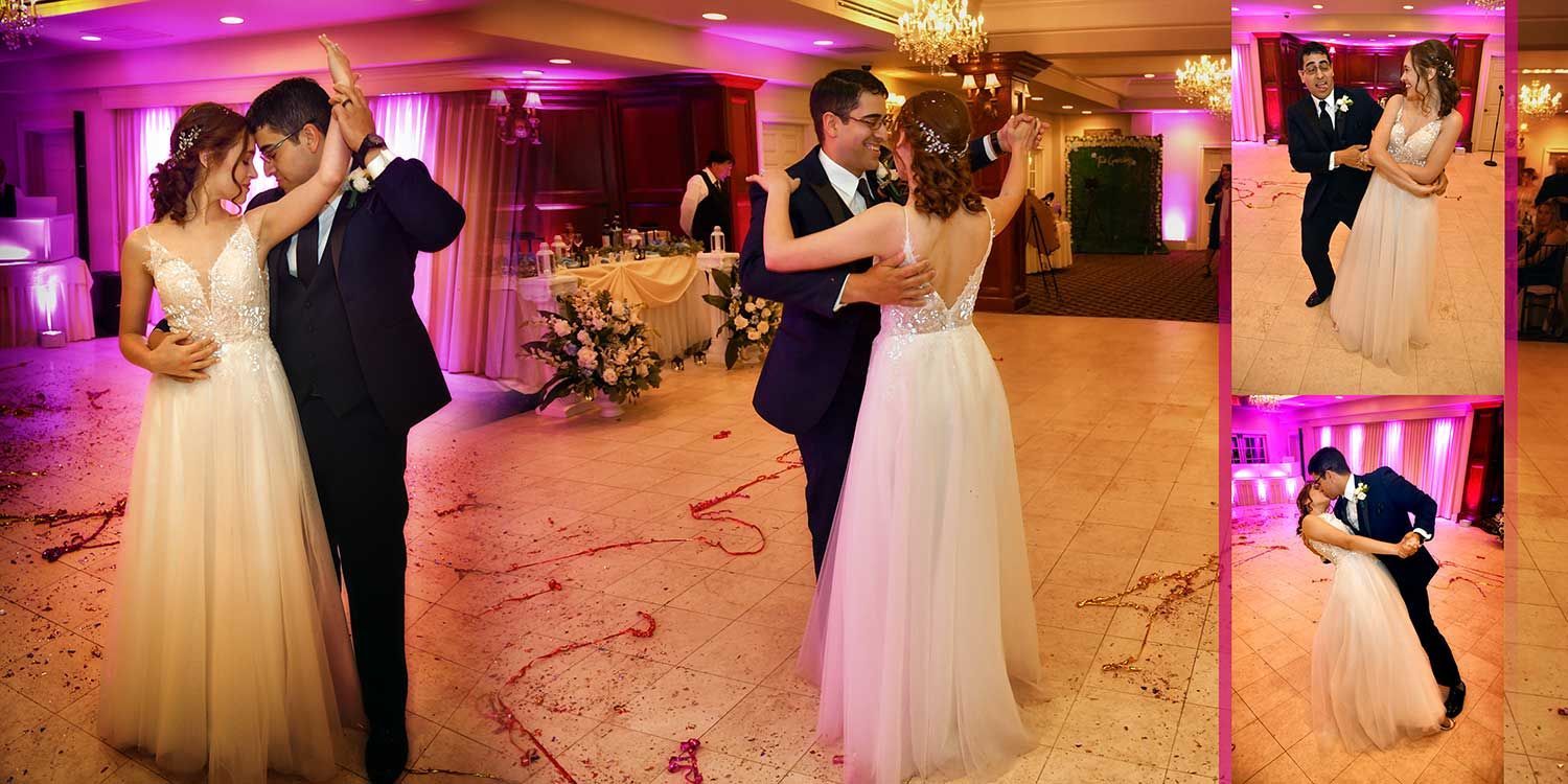 Couple dancing at a formal reception in a pink-lit ballroom with floral decor and cake table