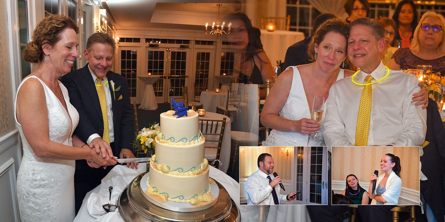 Couple cuts a white-and-gold wedding cake at a reception, with guests smiling nearby.