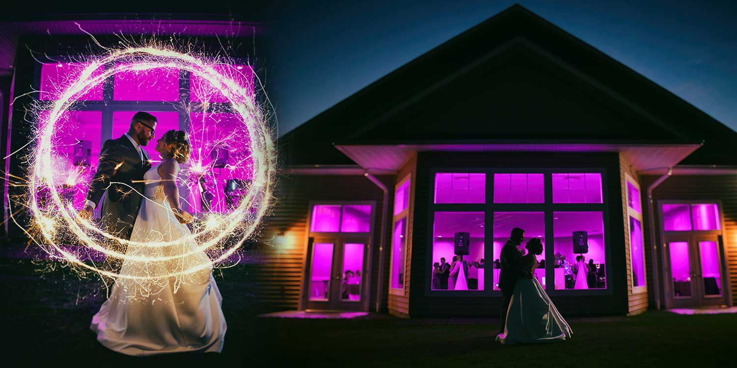 Magenta-lit wedding scene with a bride and groom dancing before a glowing circular backdrop and silhouetted guests