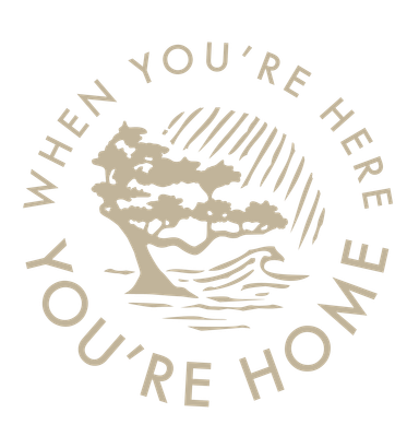 A logo with a tree and the words `` when you 're here , you 're home ''.