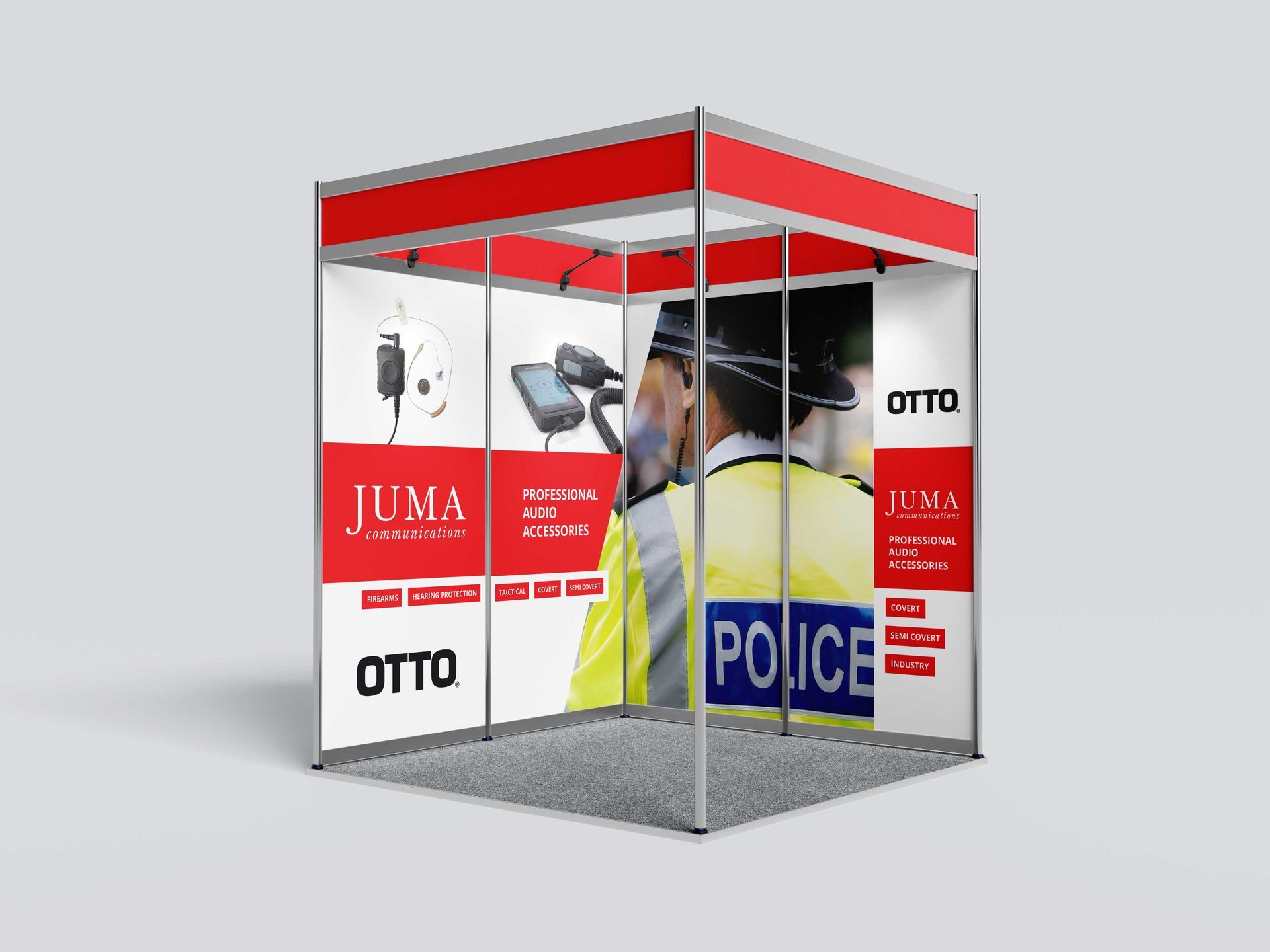 A trade booth with red and white banners and safety equipment displays