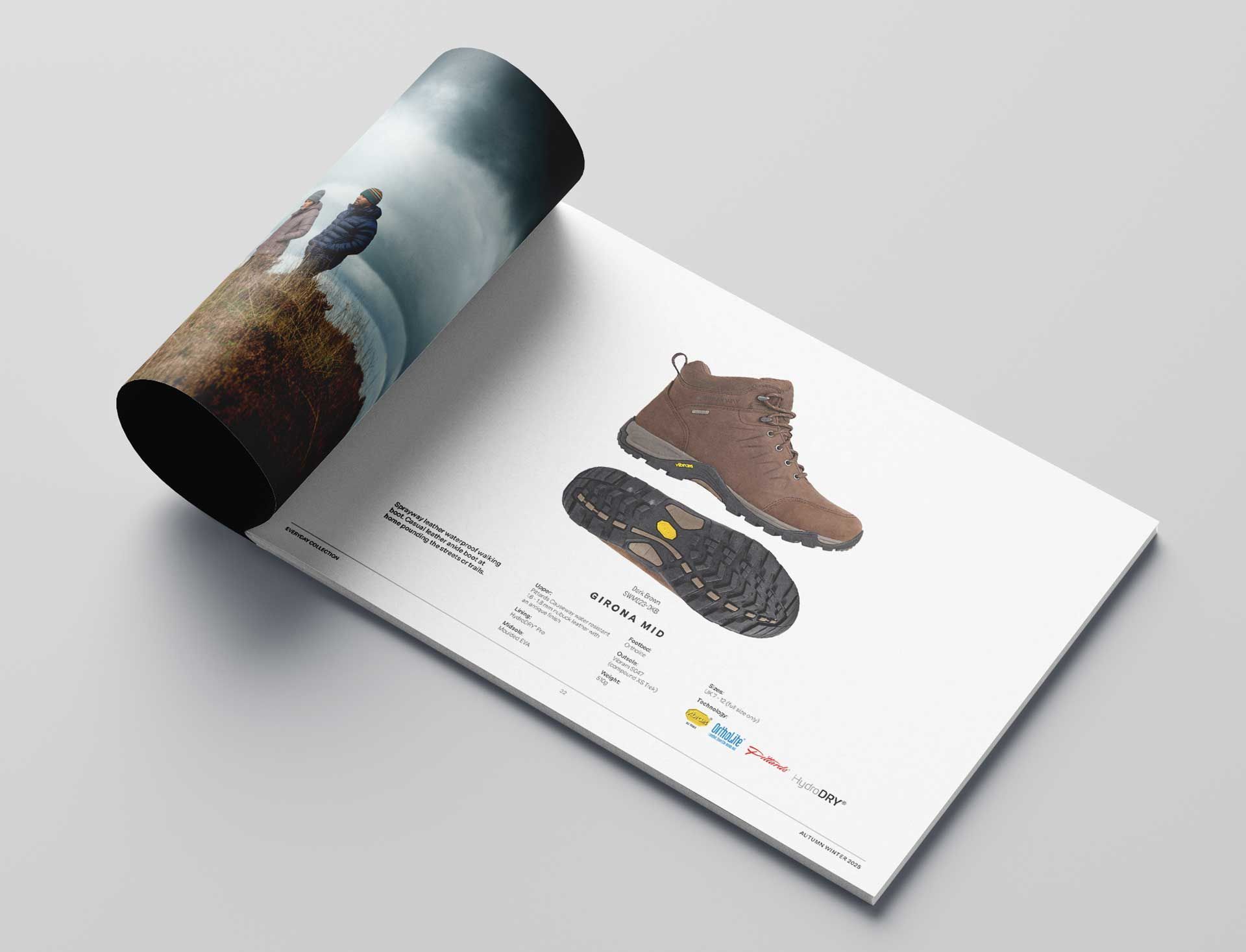 Opened catalog with hiking boot advertisement; brown boot on a white page.