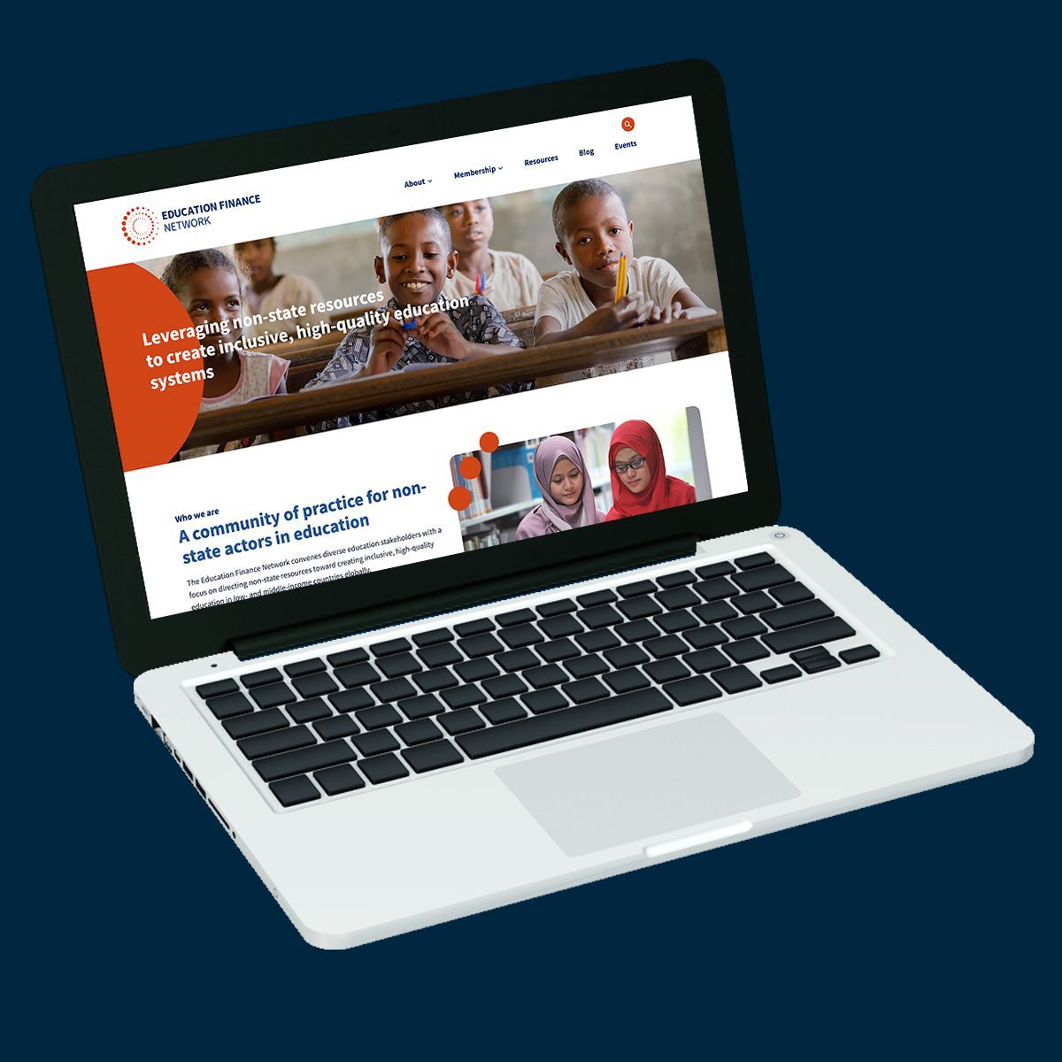 Laptop displaying a website with children in the header. The site promotes education.