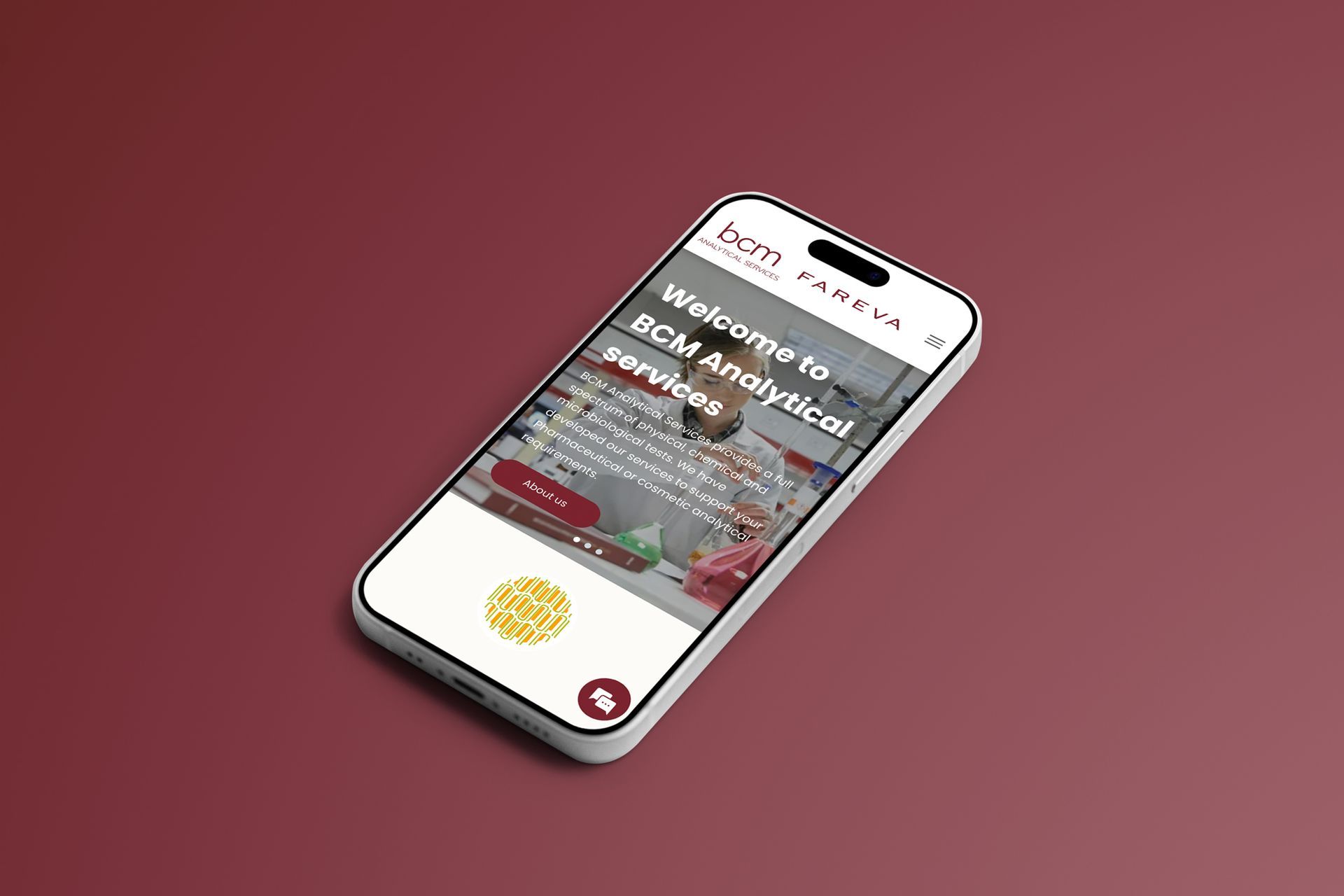 Smartphone displaying the homepage of BCM Analytical Services on a maroon background.