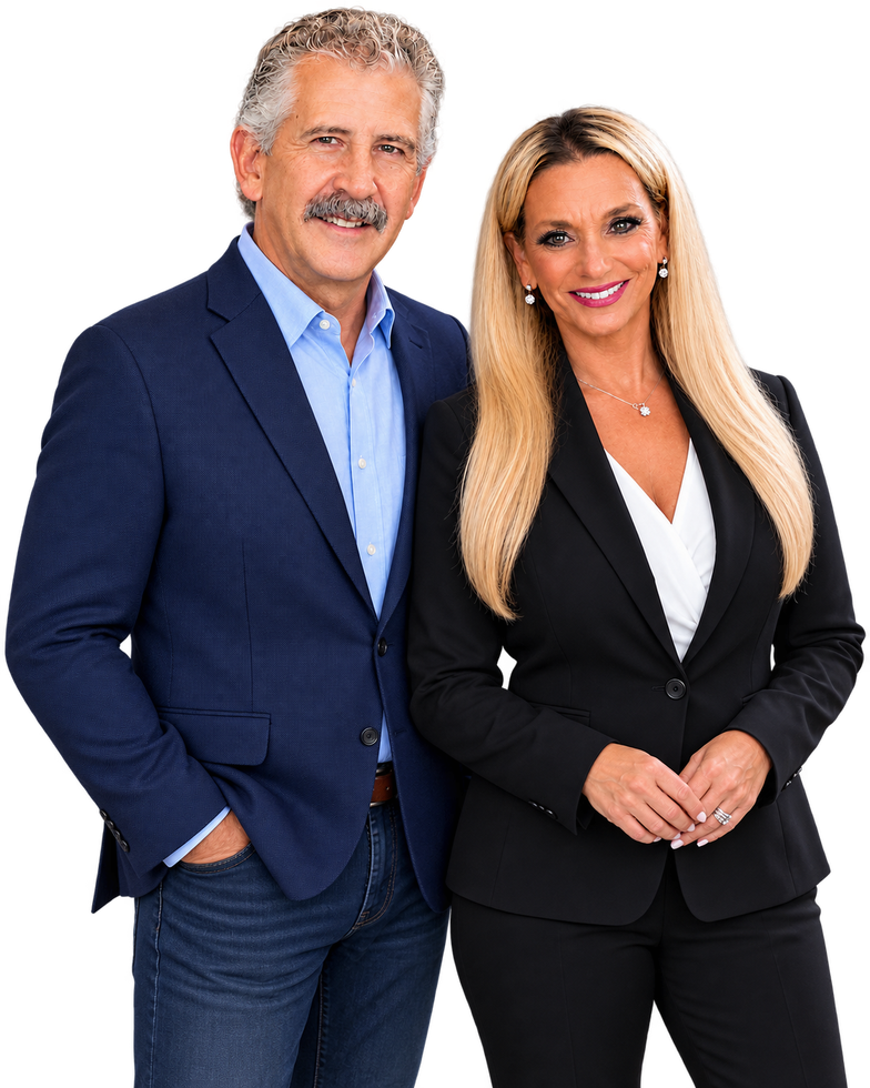 Two business professionals in navy and black suits standing together on a white background