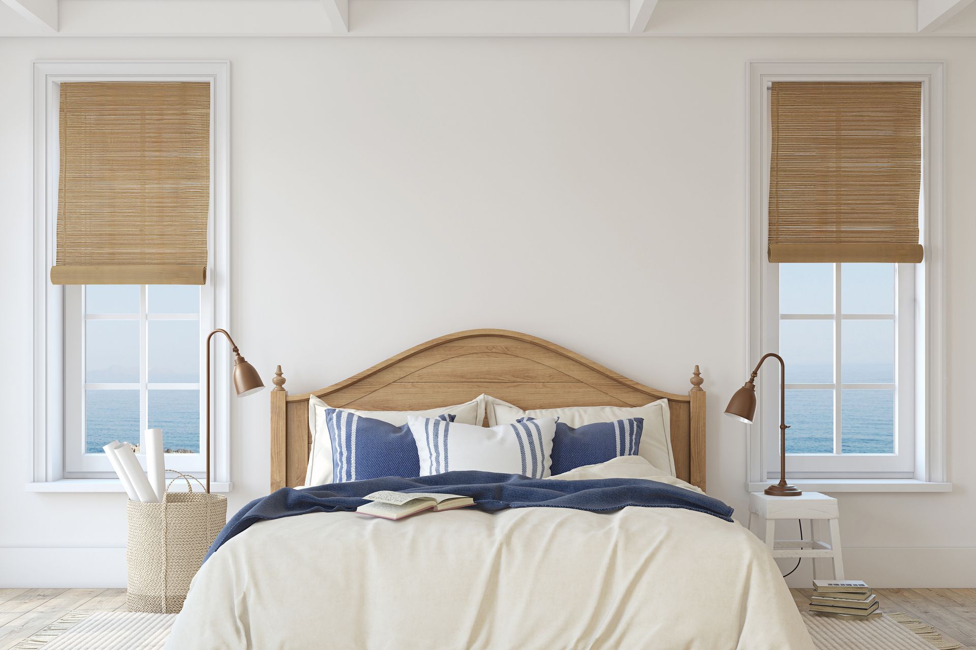 Bedroom with bed, woven windows shades, ocean view, neutral tones, and blue accents.