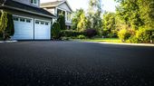 Austin and Sons Surface Protection. Black asphalt driveway