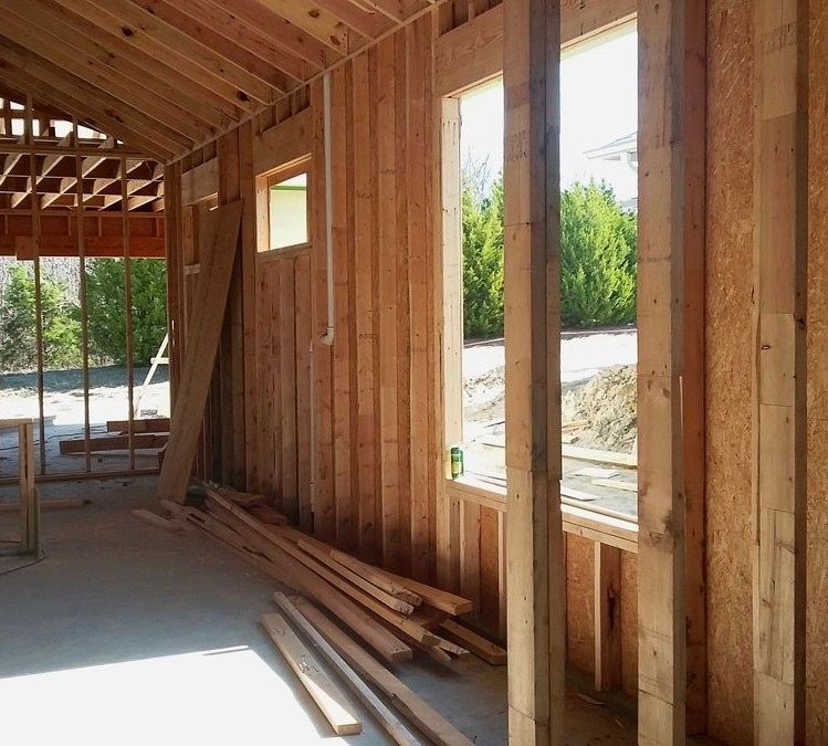 The inside of a wooden house under construction