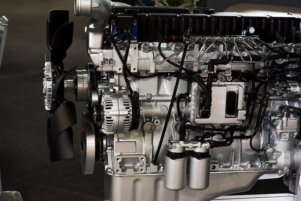Shiny, Silver Engine of a Large Vehicle — RCM Diesel & Hydraulic Services in West Rockhampton, QLD