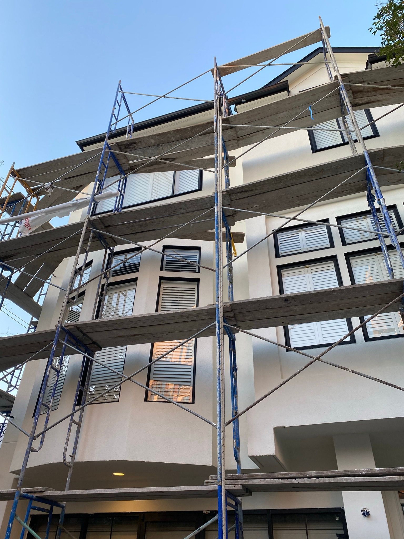 A building under construction with scaffolding around it