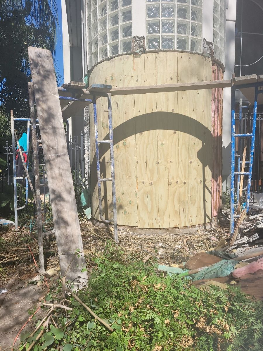 A building under construction with scaffolding around it.