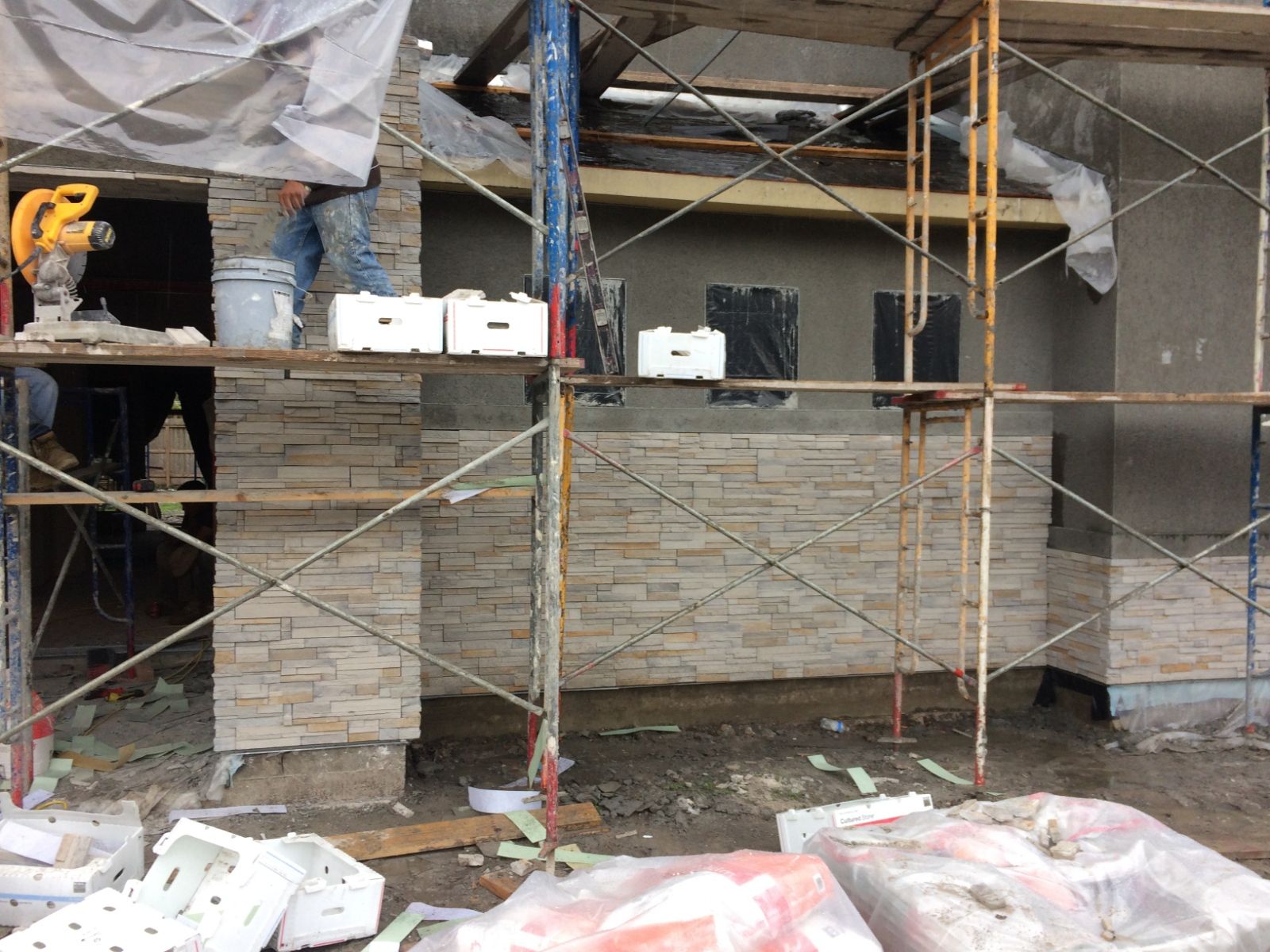 A building under construction with scaffolding around it