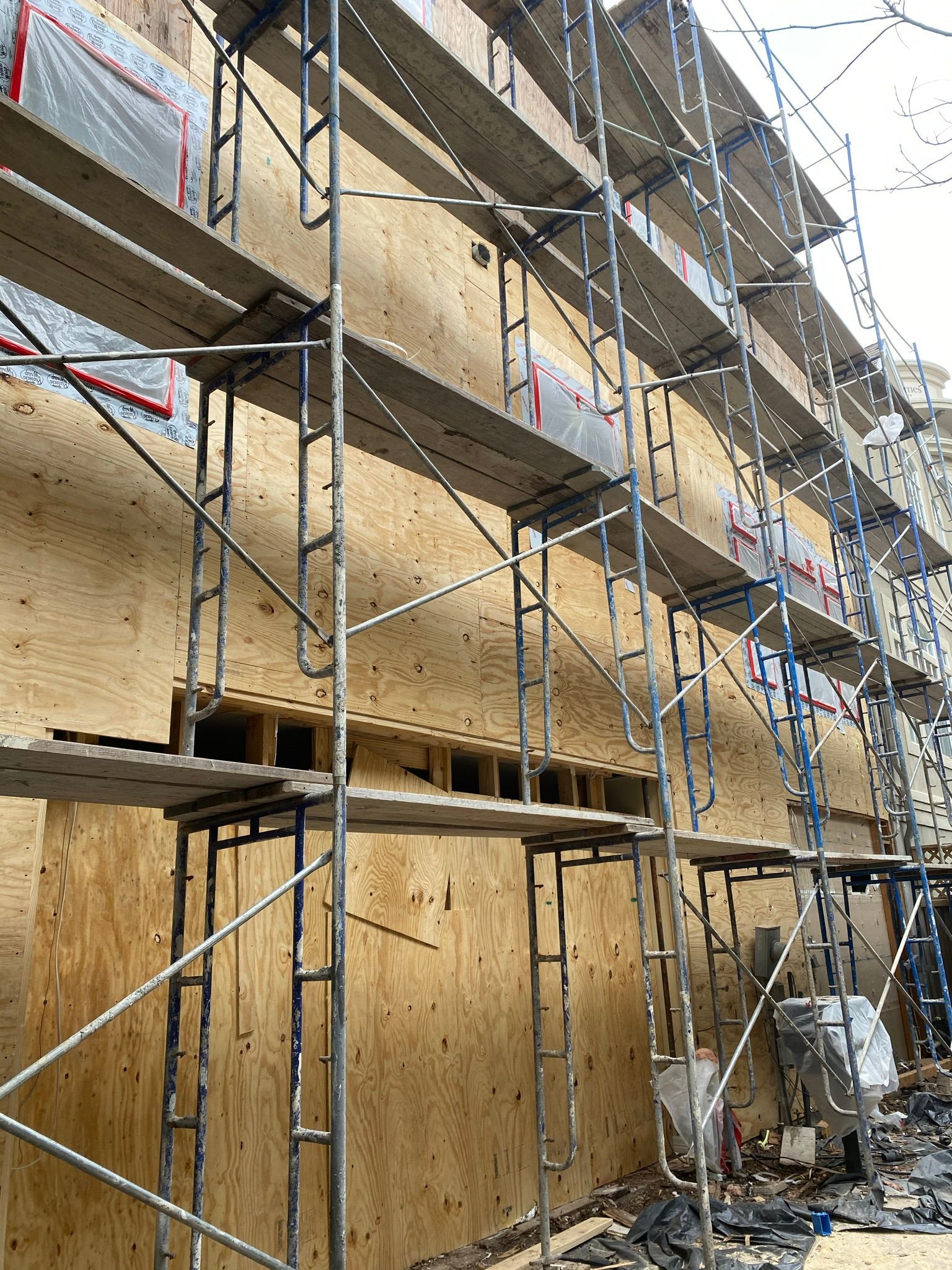 A building is being built with scaffolding around it.