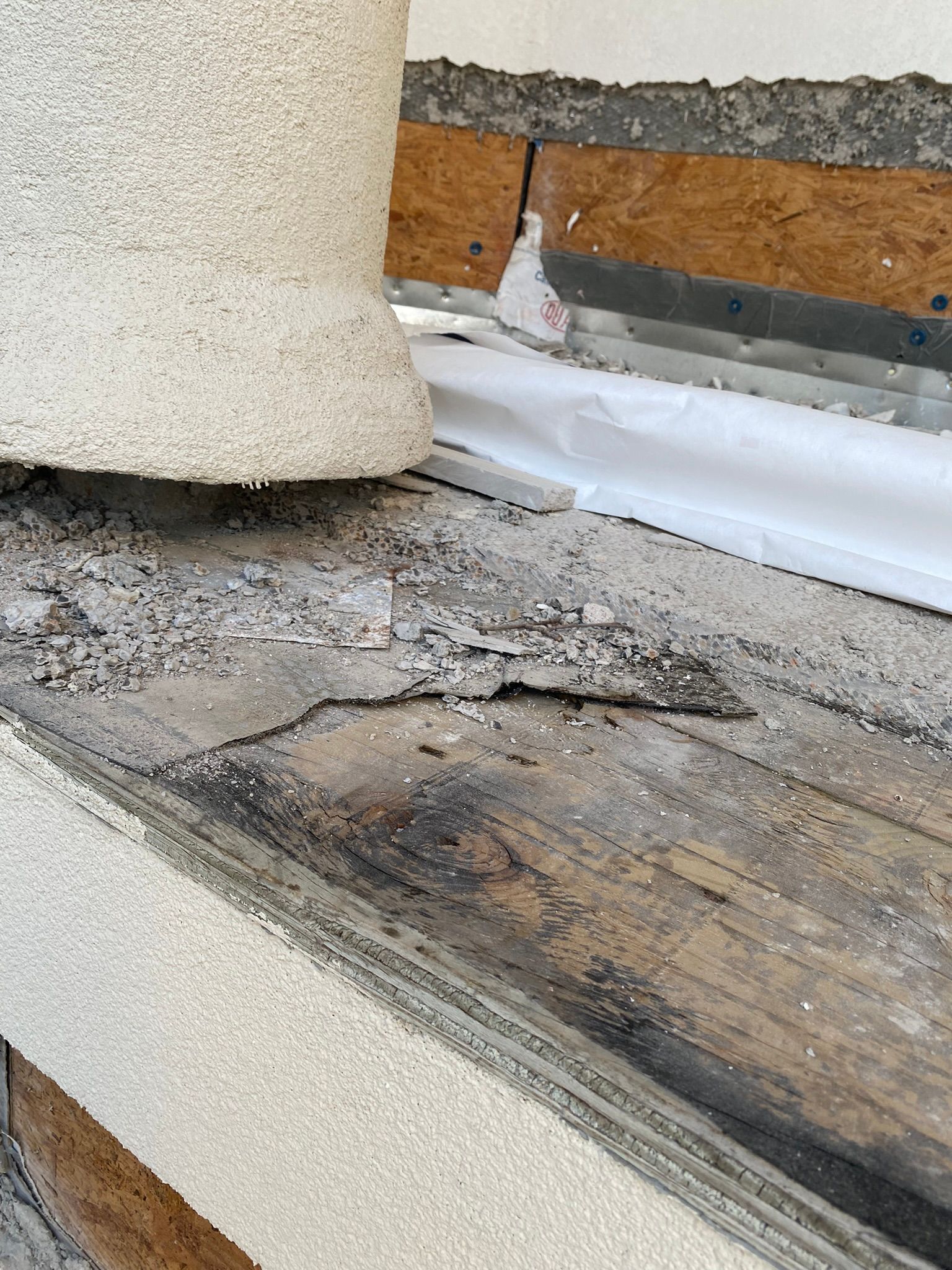 A concrete block is sitting on top of a wooden table.