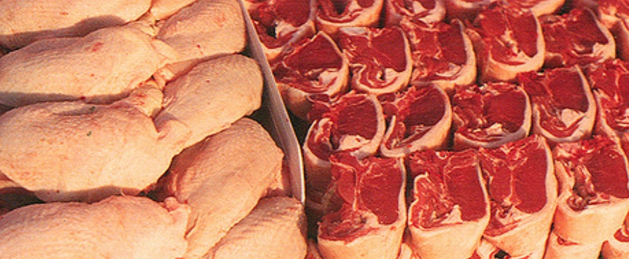 A pile of chicken and a pile of lamb are sitting next to each other.