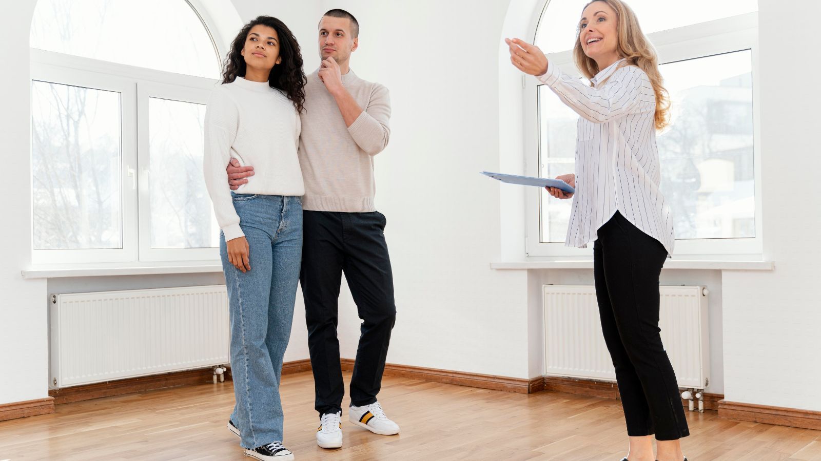 family being shown a house