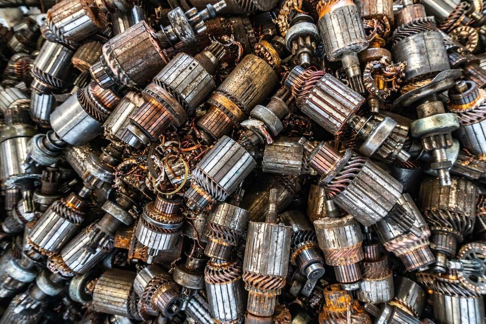 Recycling car's starter motor rotor at a scrap yard — Professional Scrap Metal Recycling in Winnellie, NT