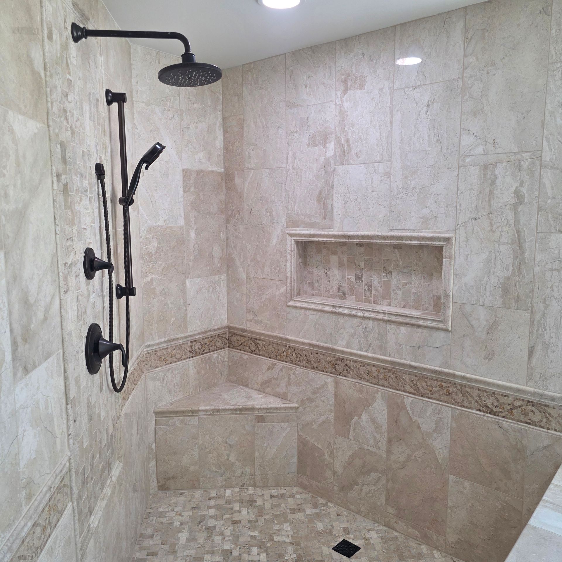 Custom Niche and Bench Seat with Marble Inlay on Walls