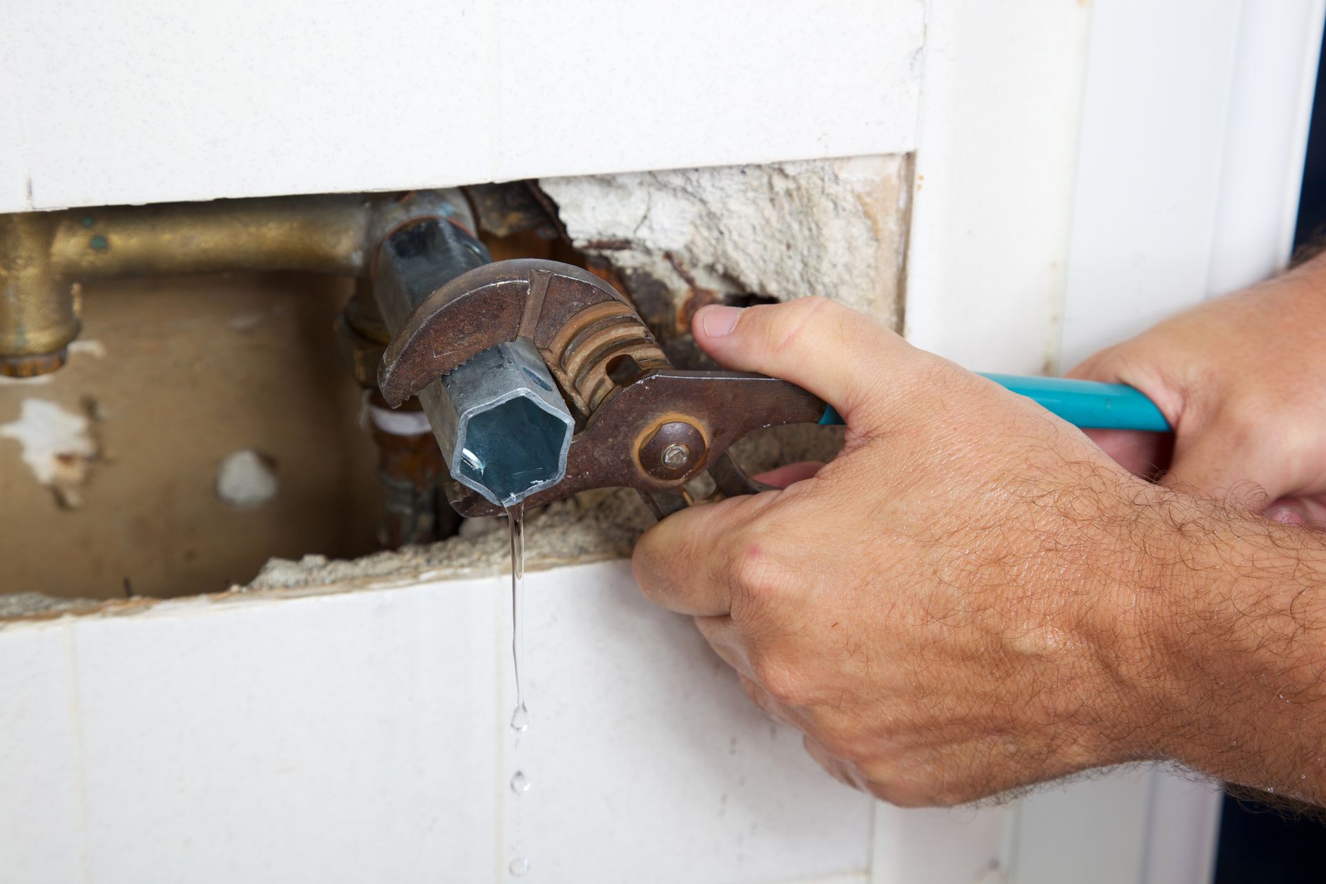 Leaking shower fixed using channel locks and faucet wrench.