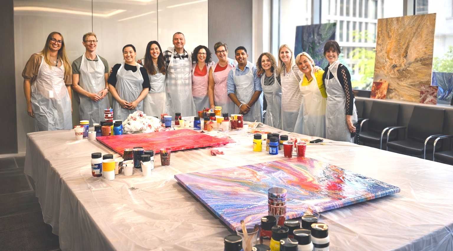 In-person acrylic pouring art team building workshop