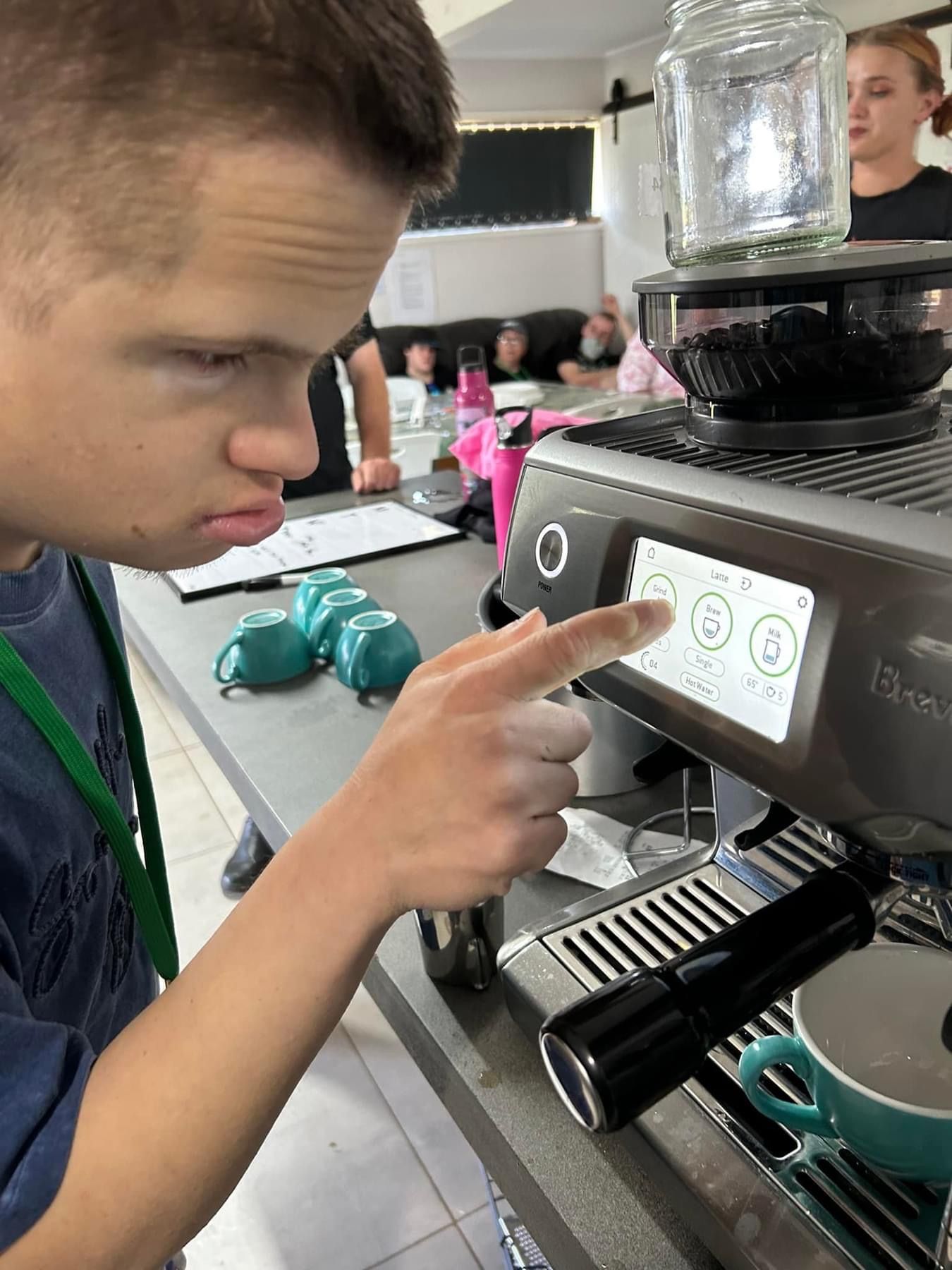 boy with down syndrome learning to bake