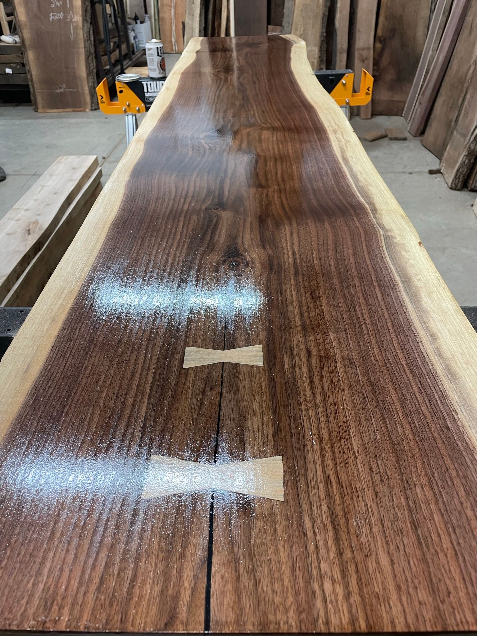 A large piece of wood is sitting on top of a table.