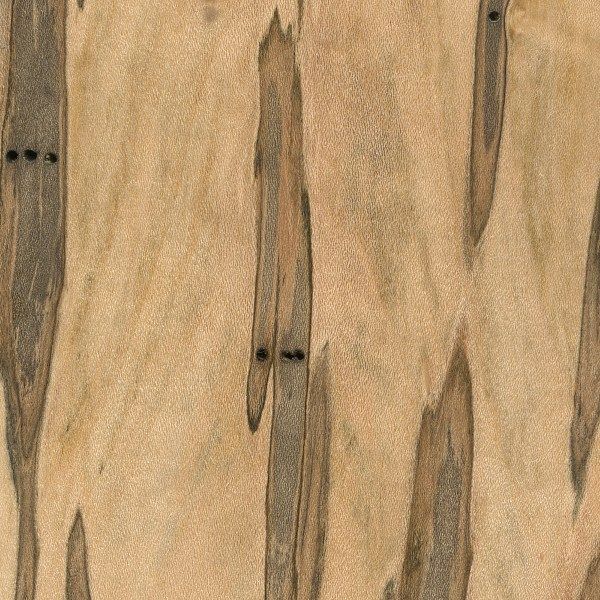 A close up of a piece of wood with a striped pattern.