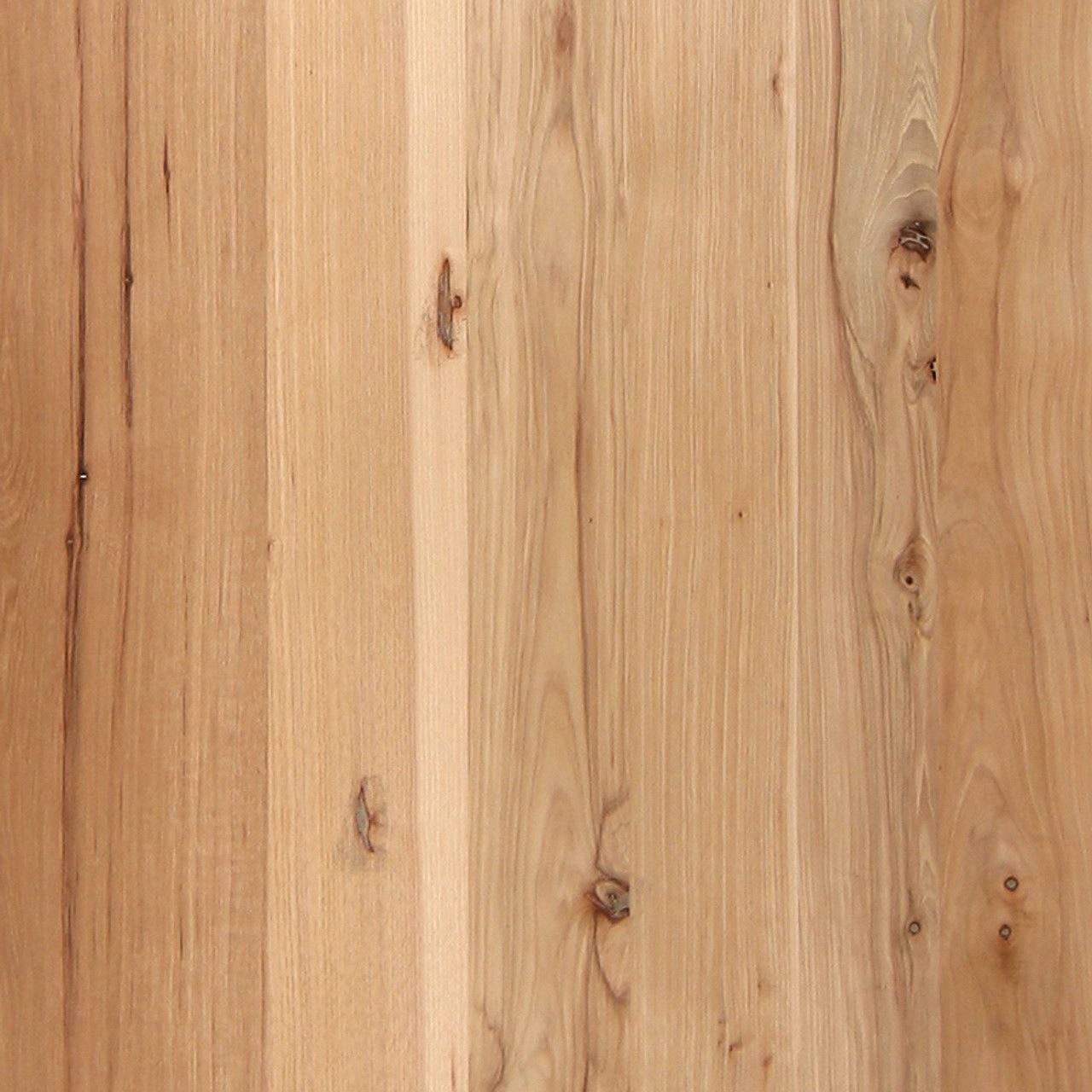 A close up of a piece of wood showing the grain and texture.