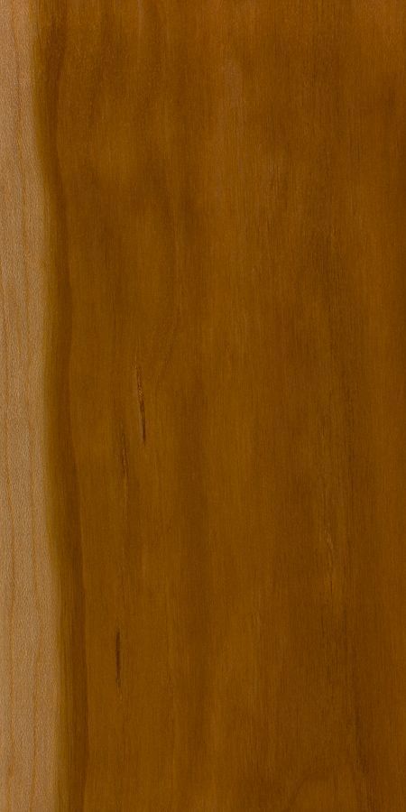 A close up of a piece of brown wood.