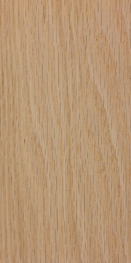 A close up of a piece of wood showing the texture of the wood.
