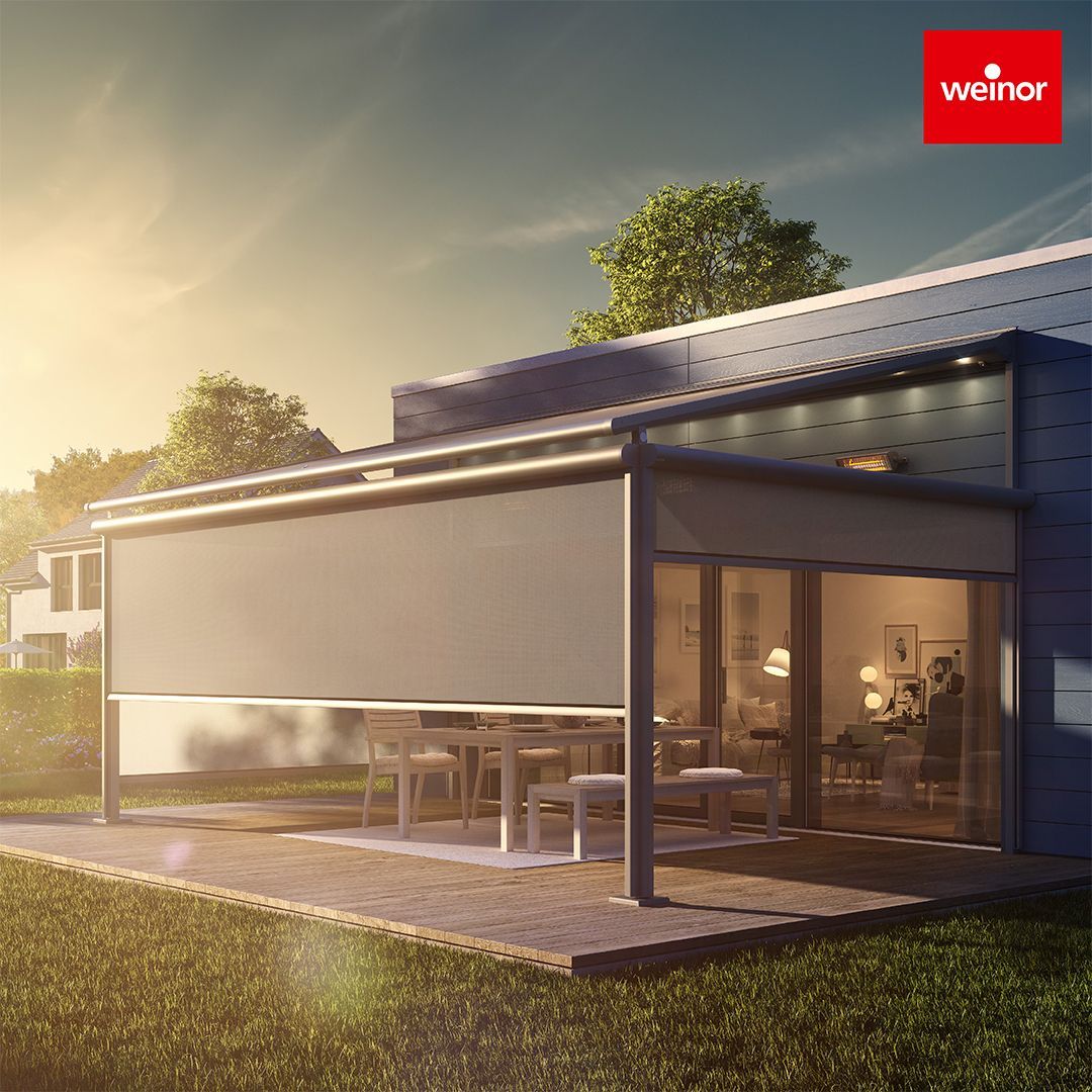 A house with a patio and a screened in porch.