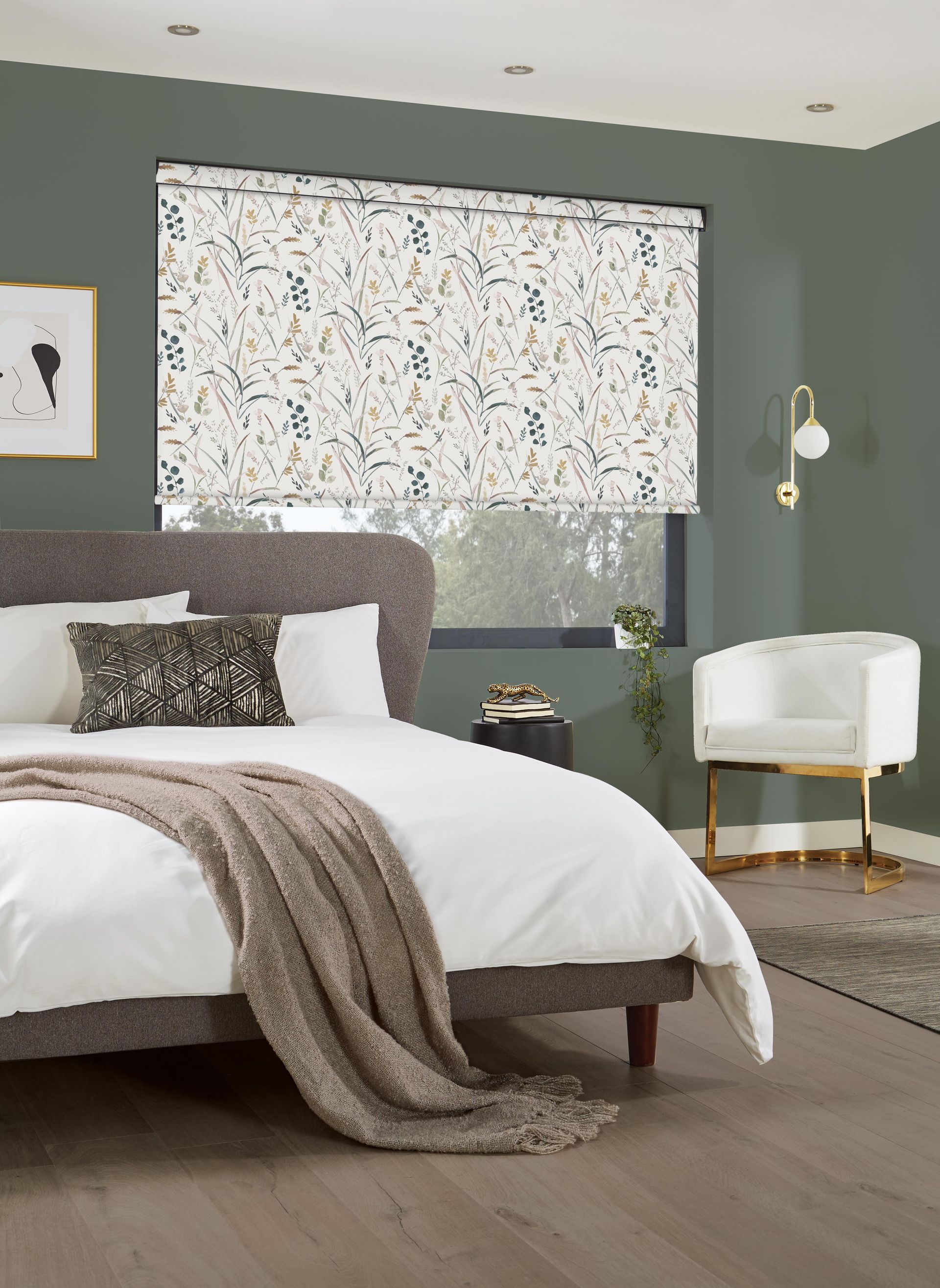 A bedroom with a bed , chair , and window.