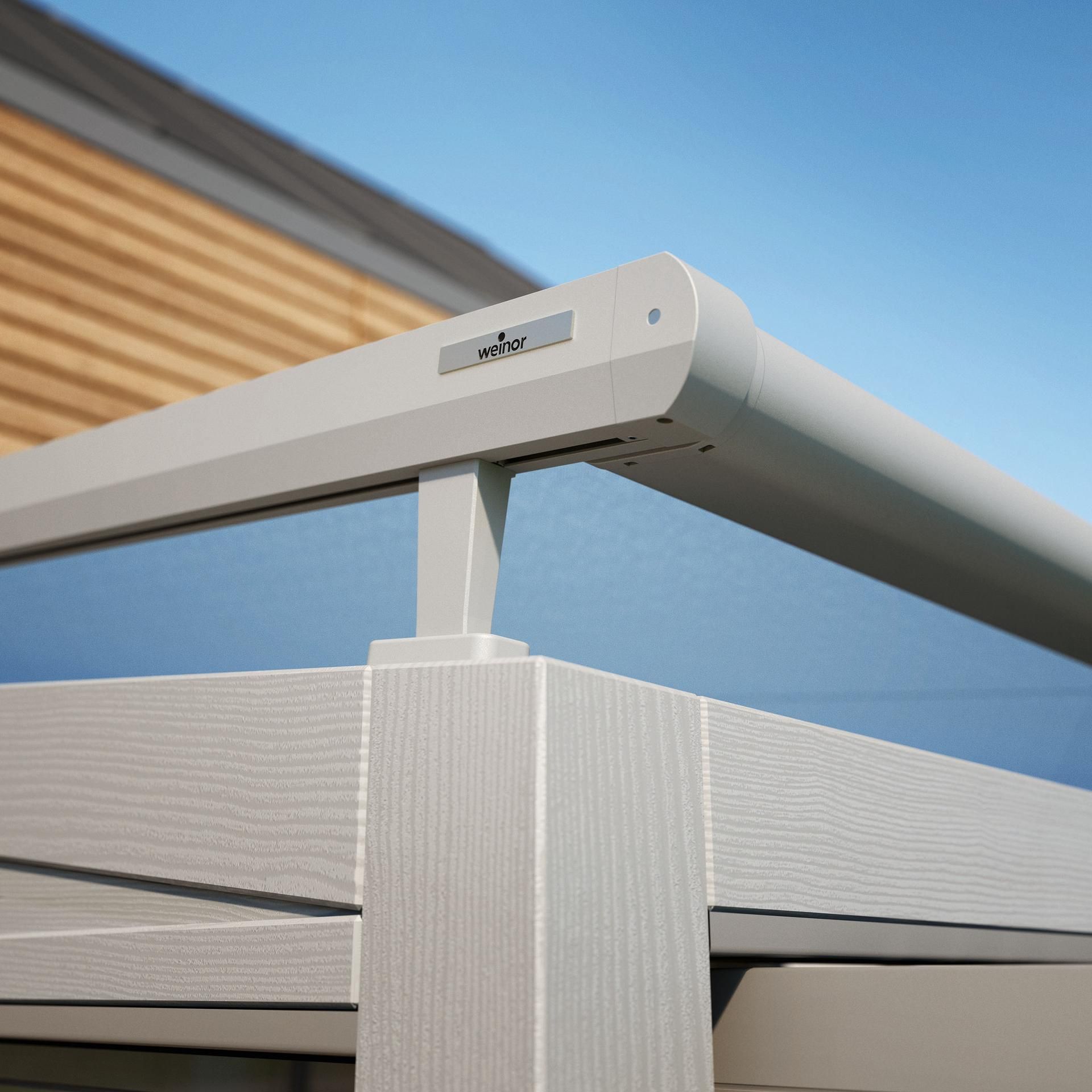 A close up of a white railing on a balcony