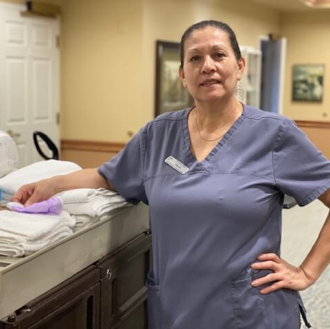 housekeeper preparing to clean senior living apartments