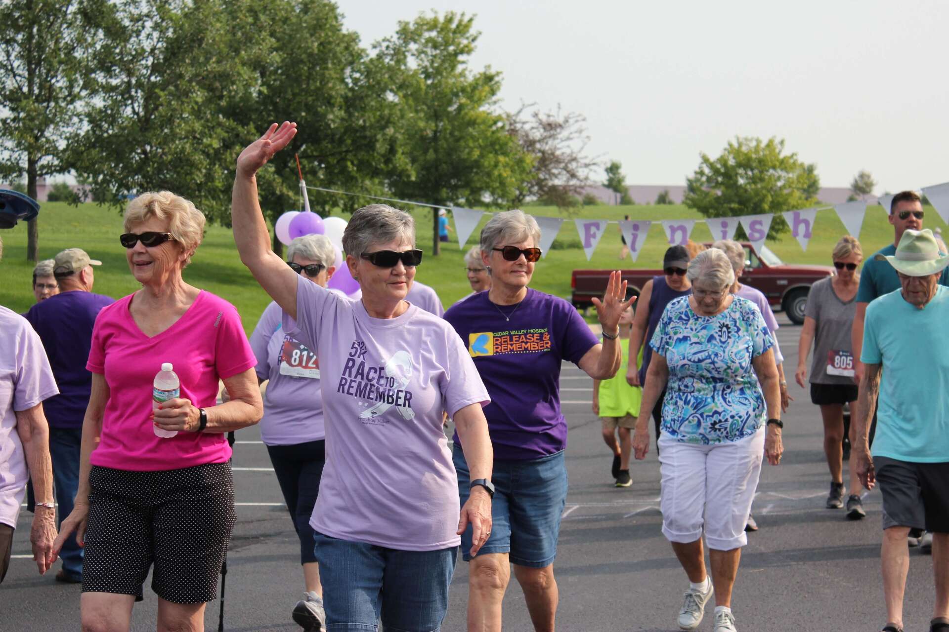 Group of retirees walking at the Race to Remember Alzheimer's Fundraiser at Landmark Commons in Waterloo