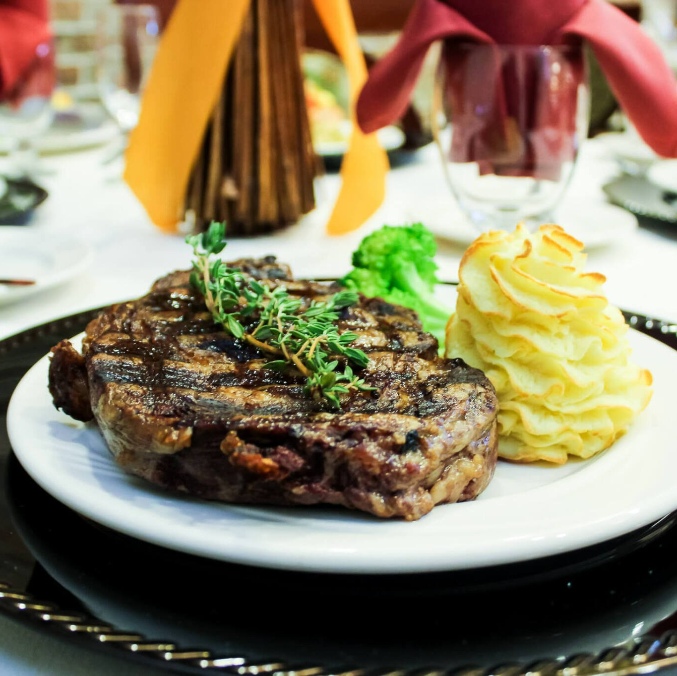 well-done steak and potatoes ready to eat