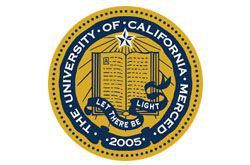 University of California, Merced seal with gold border, blue ring, and open book emblem