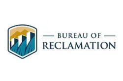 Bureau of Reclamation logo with stylized dam and mountains in blue, gold, and white