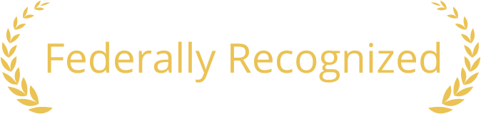 A gold laurel wreath with the words federally recognized