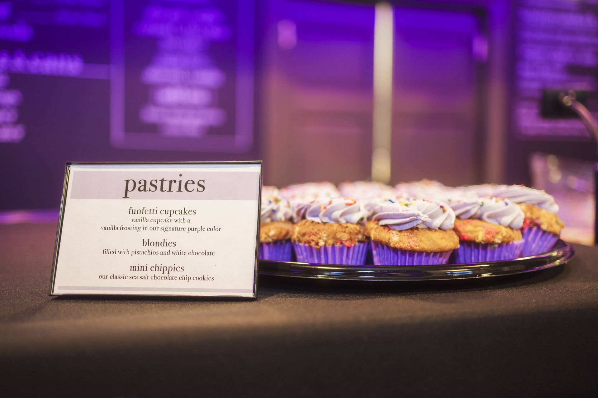 pastries sign with cupcakes