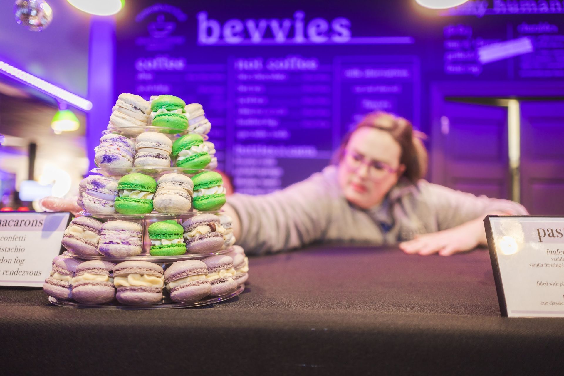 Macaron Tower with figure blurred in the background