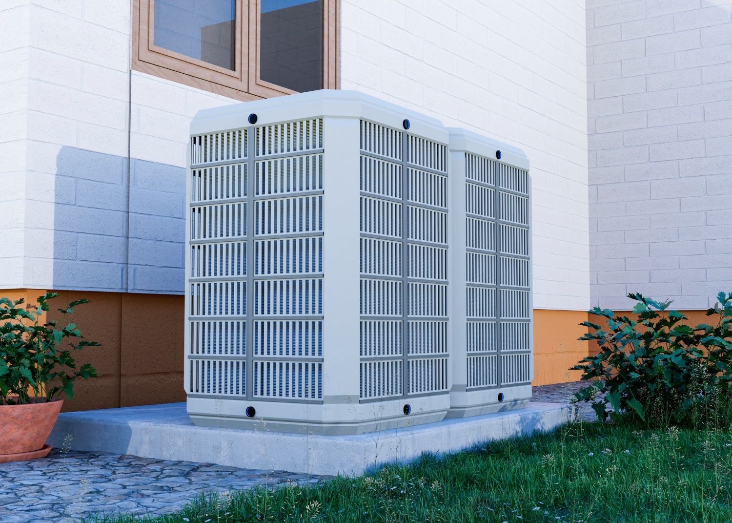 Outdoor air conditioning unit beside a house wall and window, with shrubs and grass nearby