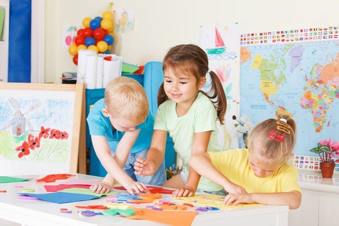 Three Preschoolers in The Classroom — Holmesville, NSW — Holmesville Playhouse Preschool