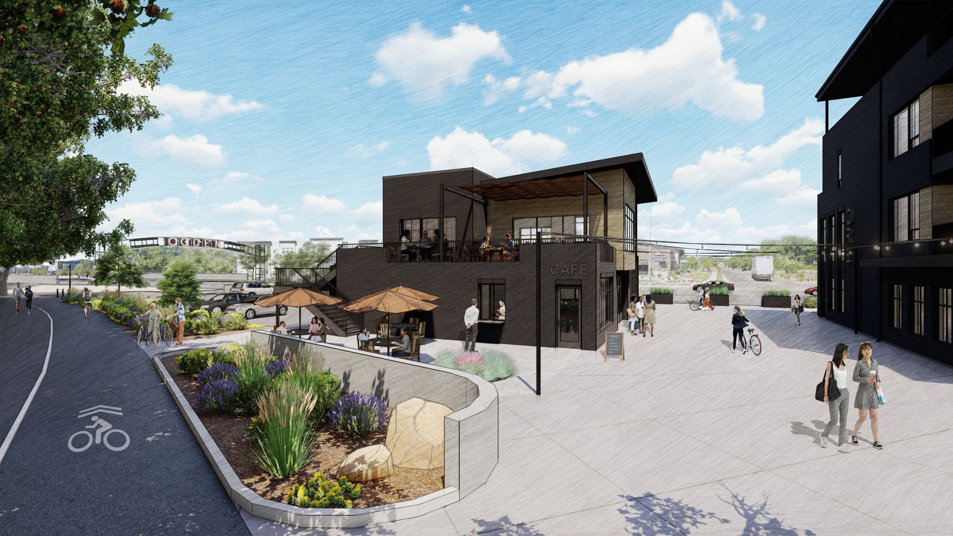 Outdoor plaza with cafe, sidewalk, bike path, and two-story dark building under a sunny sky.