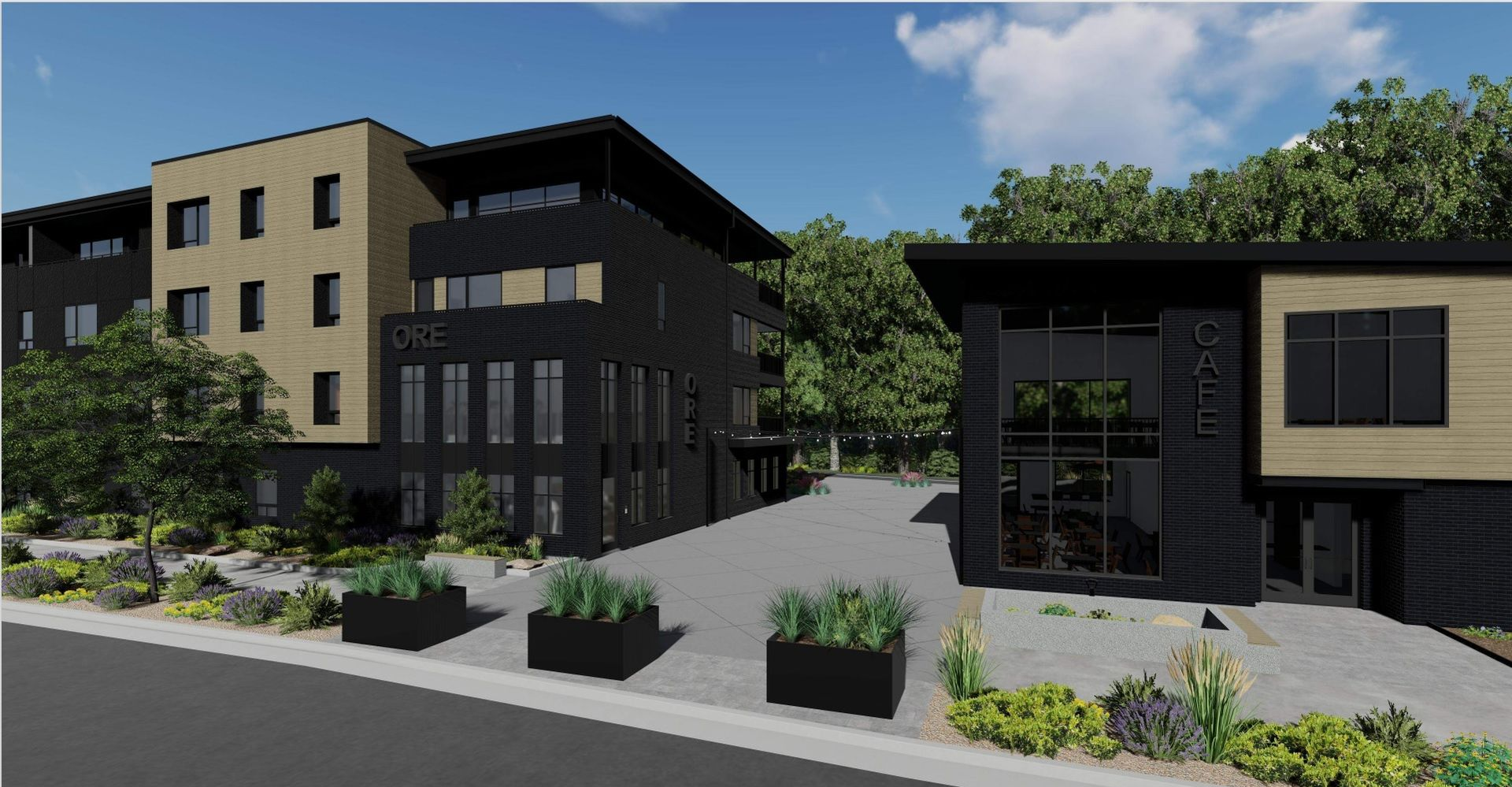Modern buildings with black and tan facades; paved courtyard, planters, and landscaping.