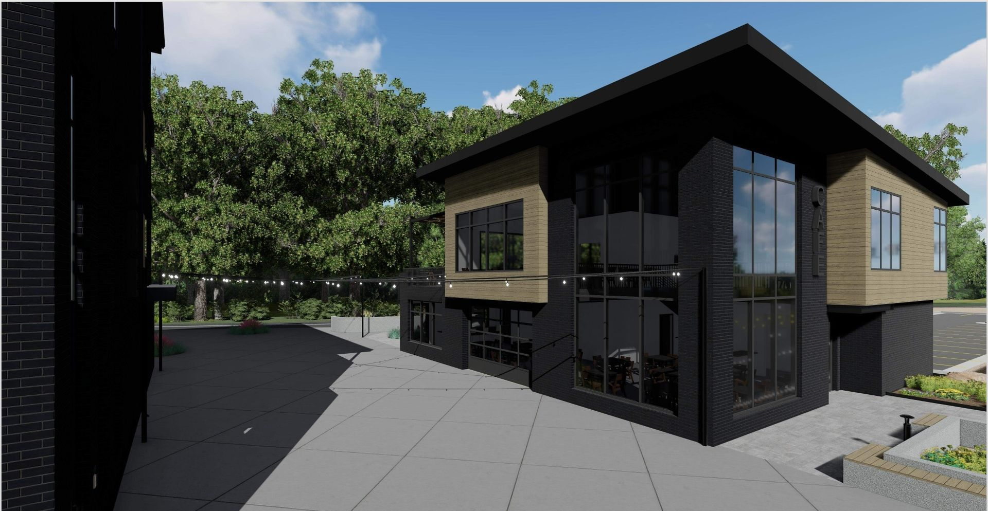Modern house with black exterior, large windows, and gray concrete.