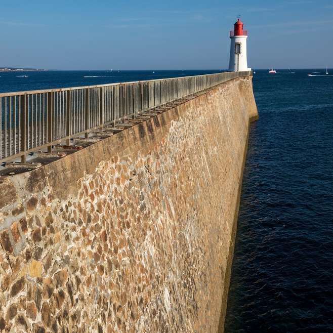 Lighthouse With Blue Ocean
