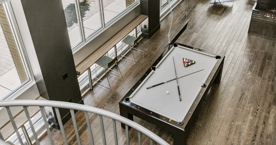 An aerial view of a pool table in a living room.