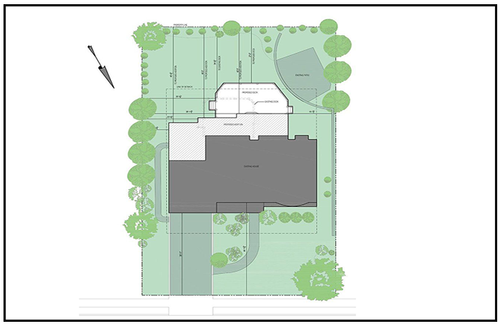 An aerial view of a house and surrounding area